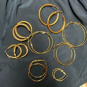 Eight pairs of hoop earrings